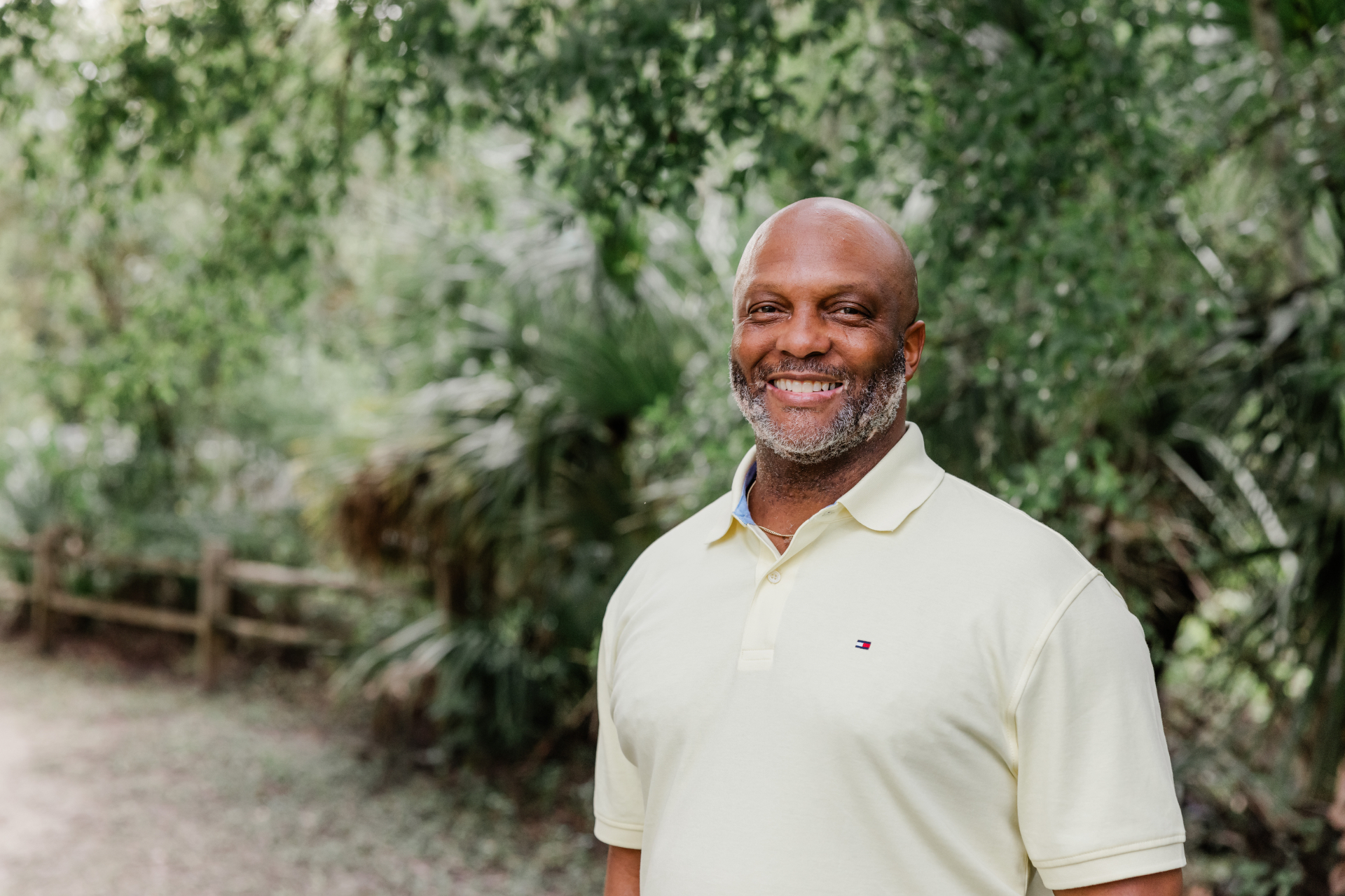 Nakia Hood, LMT, smiling outdoors in Wesley Chapel, Florida